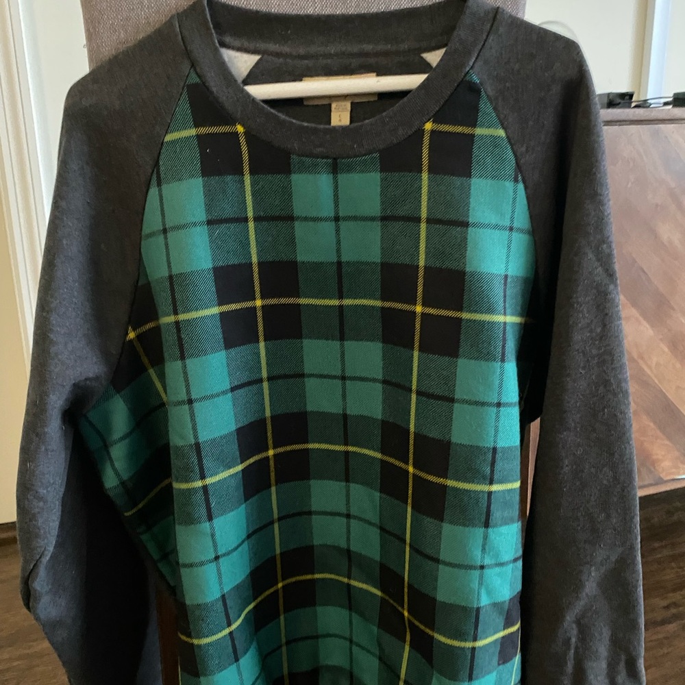 Burberry Men’s crew neck wool blend sweater with green and yellow plaid print.
